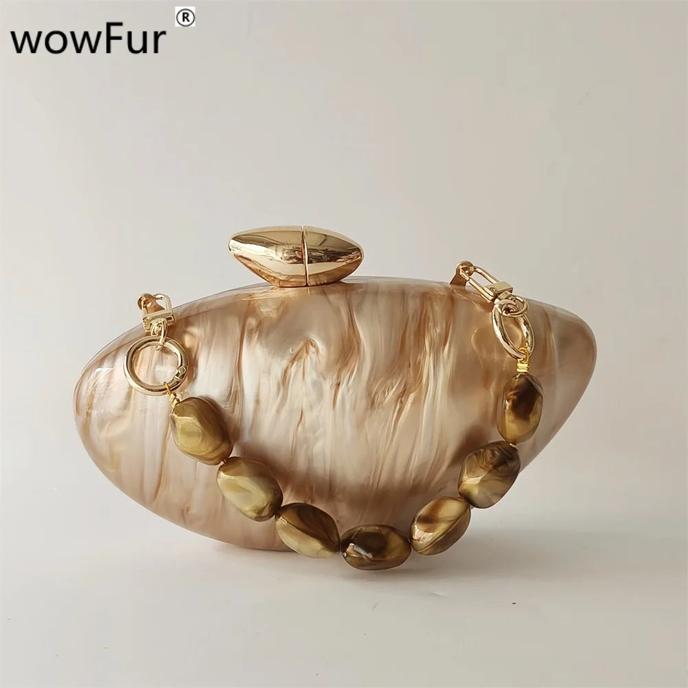 Soraya Shell Clutch - Champagne Resin
