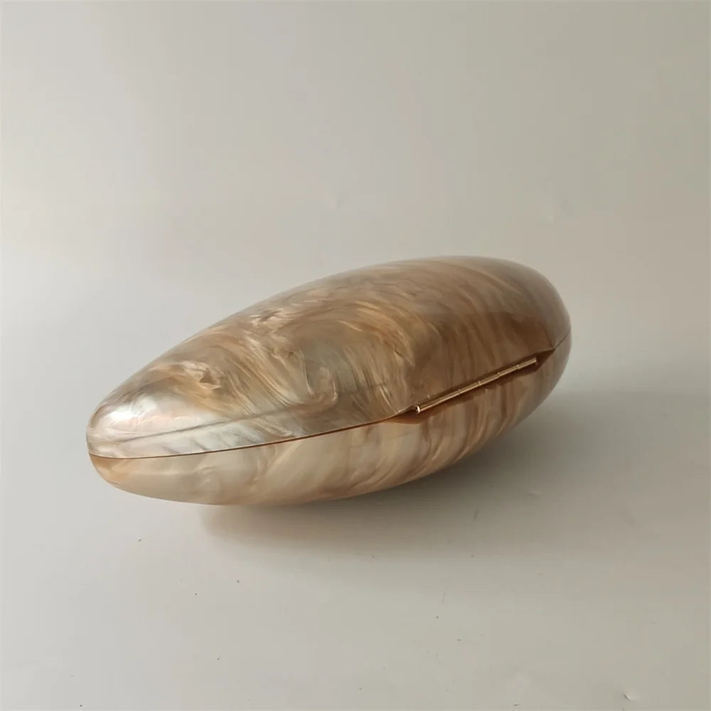 Soraya Shell Clutch - Champagne Resin