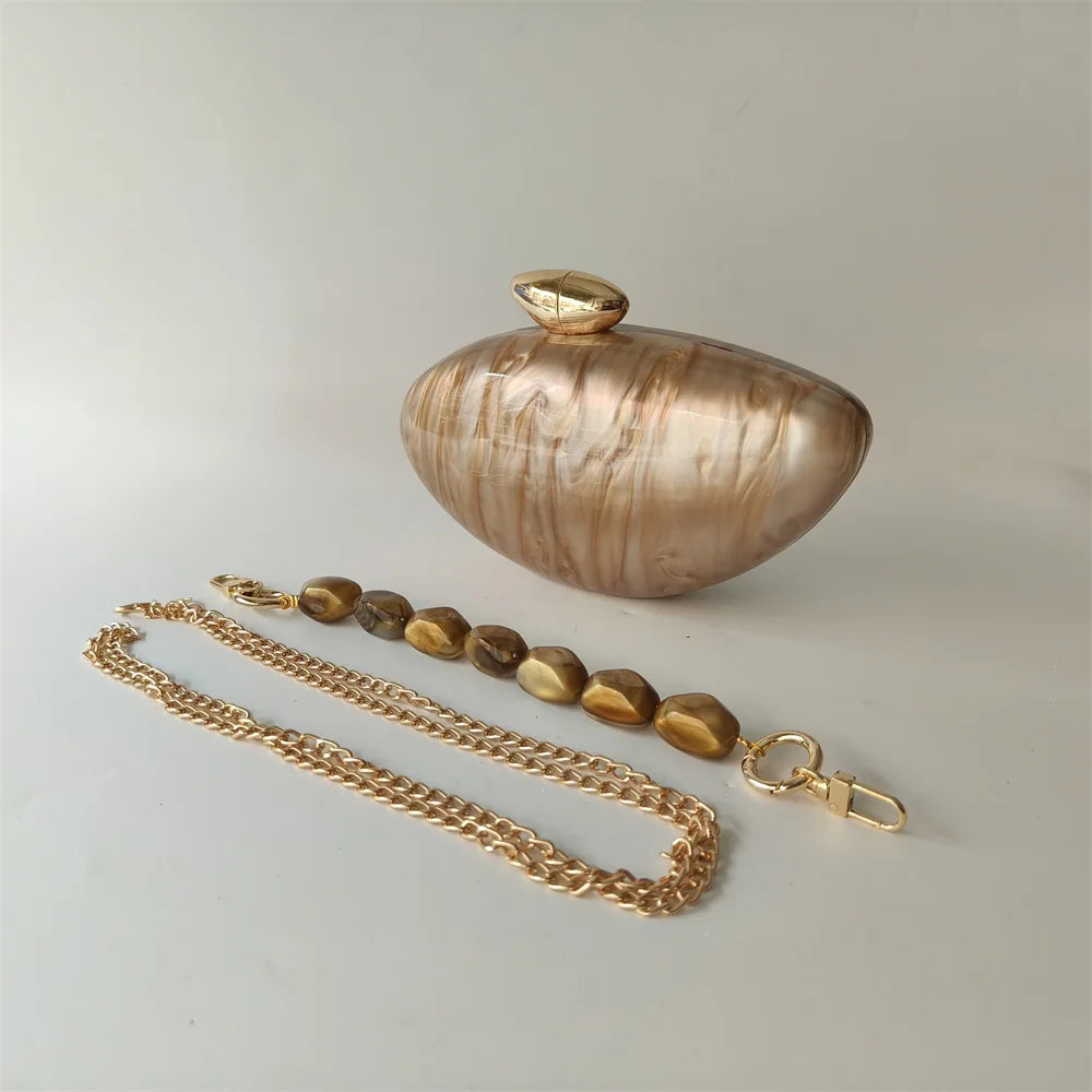 Soraya Shell Clutch - Champagne Resin