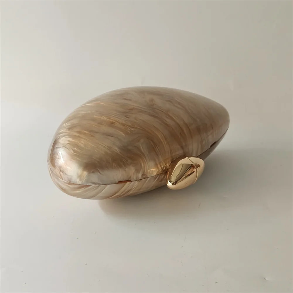 Soraya Shell Clutch - Champagne Resin