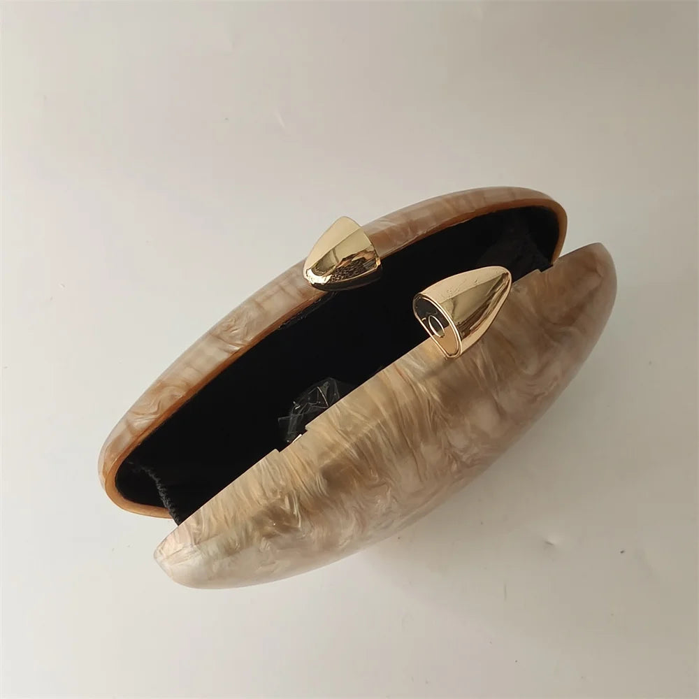 Soraya Shell Clutch - Champagne Resin