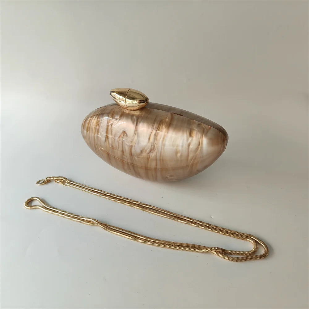 Soraya Shell Clutch - Champagne Resin
