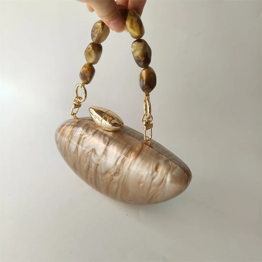 Soraya Shell Clutch - Champagne Resin
